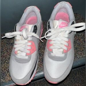 Women's Nike Air Max 90 "Recraft Rose" White and Pink Air Max Sneakers.
